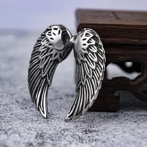 Polished stainless steel feather wing pendant necklace with vintage silver finish