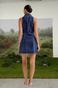Detailed back view of vintage V-neck denim dress featuring fine stitching and zipper