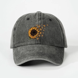 Detail of sunflower and butterfly print on dark gray washed denim baseball cap
