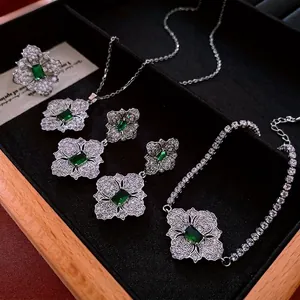 Green zircon flower jewelry set including necklace, bracelet, earrings and ring in silver
