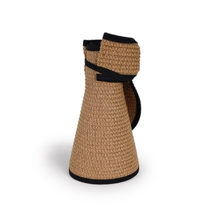 Foldable wide brim straw sun hat for women shown in a compact rolled state for travel