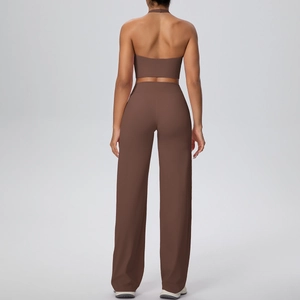 Rear view of brown halter neck sports bra and high-waisted wide-leg yoga pants set