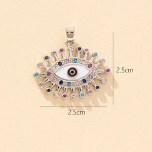 Detailed view of evil eye pendant with colorful cubic zirconia and 2.5cm dimensions