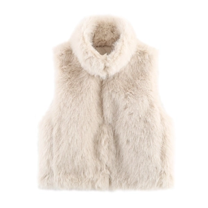 Close-up of beige faux fur vest showing detailed plush texture and soft long fibers