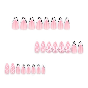 Pink French press-on nails with cow print almond shape and 3D white ribbon bows