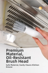 Macro detail of ergonomic handheld window and kitchen cleaning brush with gray fiber brush head