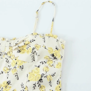 Floral print poplin midi dress with delicate spaghetti straps and pleated neckline details