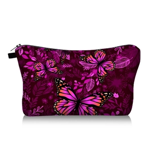 Detail of butterfly print makeup bag with durable fabric and premium black zipper closure