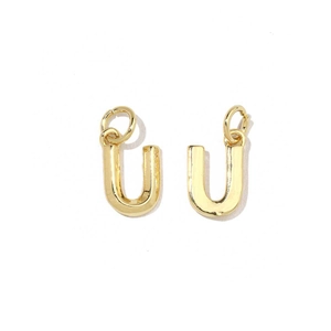 Detailed macro view of U-shaped 18K gold-plated letter charms with open rings