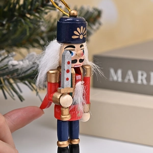 Classic 12cm wooden nutcracker soldier ornament with red coat and gold hanging string