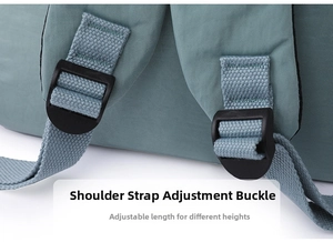 Detail of adjustable padded shoulder straps with plastic buckles on nylon backpack