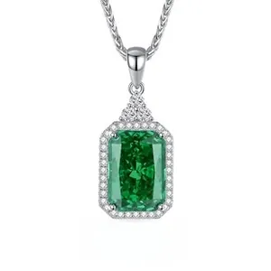 Close-up of S925 silver necklace featuring a rectangular emerald-cut green gemstone