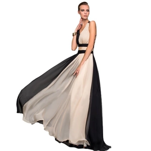 Elegant sleeveless contrast gown in champagne and black with a flowing long skirt