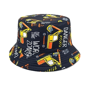 Detail of kids black bucket hat featuring yellow excavator and WORK ZONE print patterns