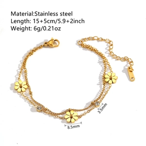 Double-layered golden stainless steel bracelet with daisy flower and zircon stones