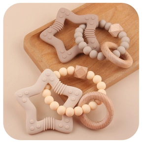 Baby silicone star teether set with natural wood beads and textured teething bracelet