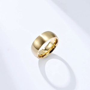 Polished gold wide stainless steel ring with brushed matte exterior finish