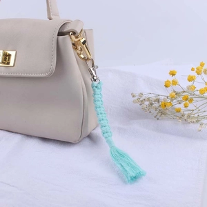 Handmade light blue woven cotton keychain accessory for handbags with metal clasp