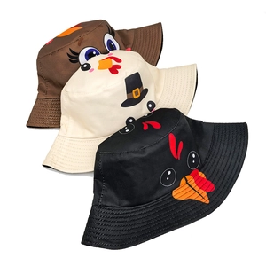 Three colors of Thanksgiving turkey bucket hats in brown, cream, and black cotton twill