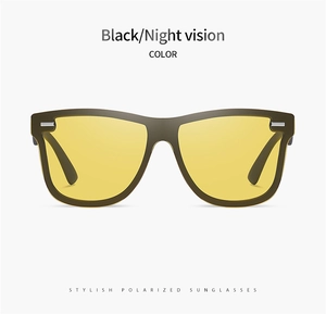 Close-up of black frame polarized night vision sunglasses with yellow lenses
