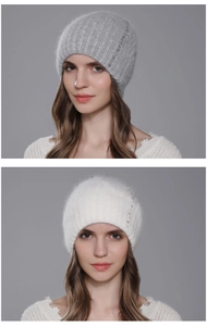 Detail of warm winter knit hat for women featuring elegant pearl and rhinestone accents