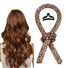 Heatless hair curler set with leopard print rod, two scrunchies and a black claw clip