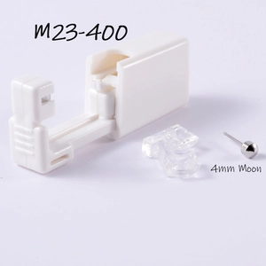 Detail of disposable ear piercing gun with a 4mm Moon stud and M23-400 marking
