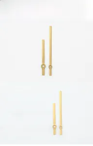 Detail view of model 249 gold metal clock hands including hour and minute needles