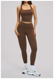 Detail of high-waisted dark brown quick-dry yoga set showing matte texture and slim fit design