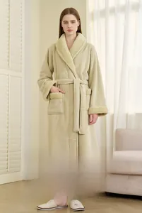 Close-up detail of double-layer thickened fleece bathrobe with soft plush contrast cuffs