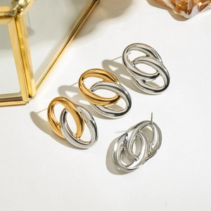 Boucles d'oreilles entrelacées minimalistes en acier doré et argenté de luxe