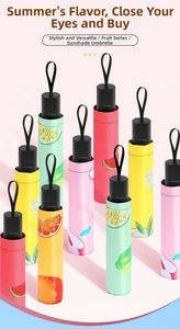 Detail view of portable fruit pattern umbrellas with compact folding design and UV coating