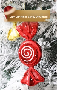 Detail of 12cm red and white striped candy Christmas ornament on a snowy tree
