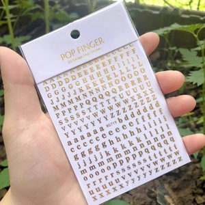 3D gold alphabet nail stickers WG719 featuring uppercase and lowercase letters