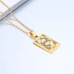 Detailed close-up of a gold stainless steel Pisces zodiac necklace with rectangular pendant