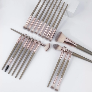Professional 20-piece makeup brush set with earth-tone handles and rose gold ferrules