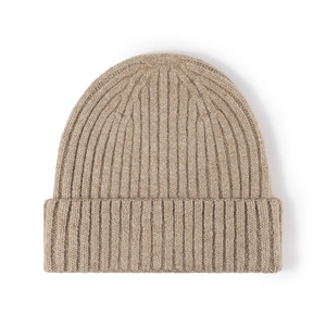 Thick ribbed wool knit beanie in oatmeal color with wide fold-over cuff for winter warmth