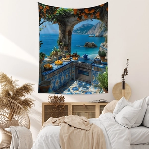 Detail of Mediterranean ocean view tapestry hanging over a bed in a cozy bedroom