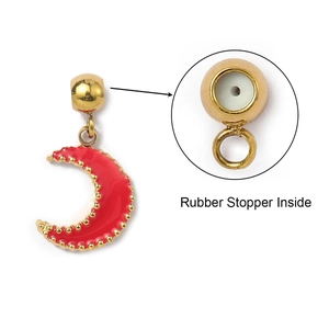 Detail of moon pendant with red enamel finish and internal rubber stopper structure