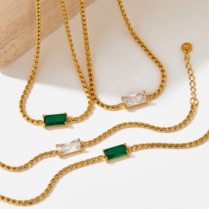 Minimalist gold stainless steel necklaces with green and clear rectangular gemstones
