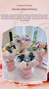 Detail of colorful handmade crochet flower bouquet in a pink hug bucket gift box