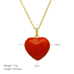 Detail view of red heart pendant necklace with dimensions 26x35mm and 45+5cm gold chain