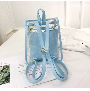 Detail of light blue transparent PVC backpack with inner drawstring pouch and gold buckles
