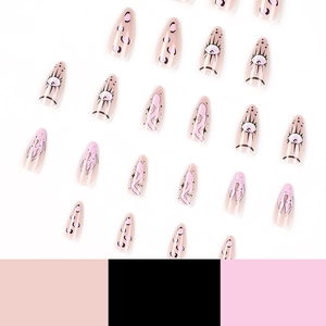 Pink stiletto press-on nails with pop art eyes, leopard print and flame patterns