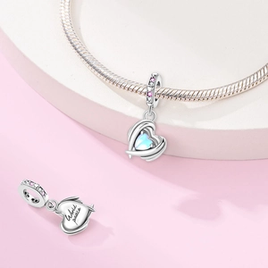 Silver heart charm with blue iridescent inlay and World Peace engraving for bracelets