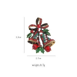 Detailansicht einer Weihnachtsglocken-Brosche mit Strasssteinen, Maße 3,8cm x 2,7cm