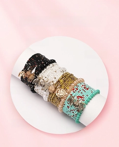 Bohemian multi-layer seed bead bracelet set featuring tree of life and leaf charms