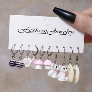 Detailed set of 5 pairs resin earrings featuring bear, mushroom, and cloud charms on a card