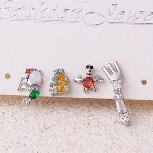 Set of 4 silver earrings featuring zircon-studded mermaid, pear, turtle, and fork designs