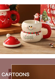 Macro shot of a Christmas snowman ceramic mug with a red hat lid and festive stirrer